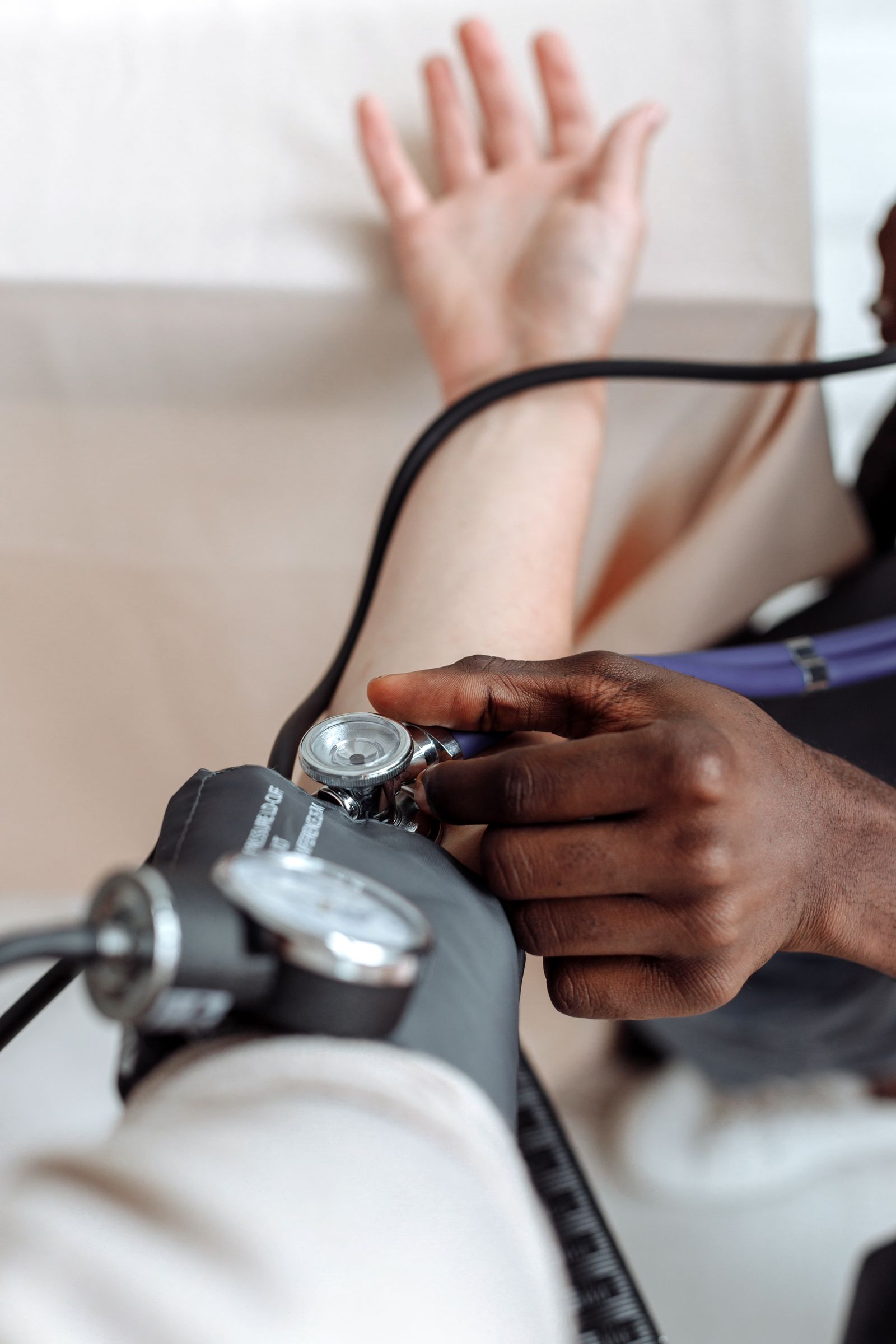A blood-pressure reading being taken