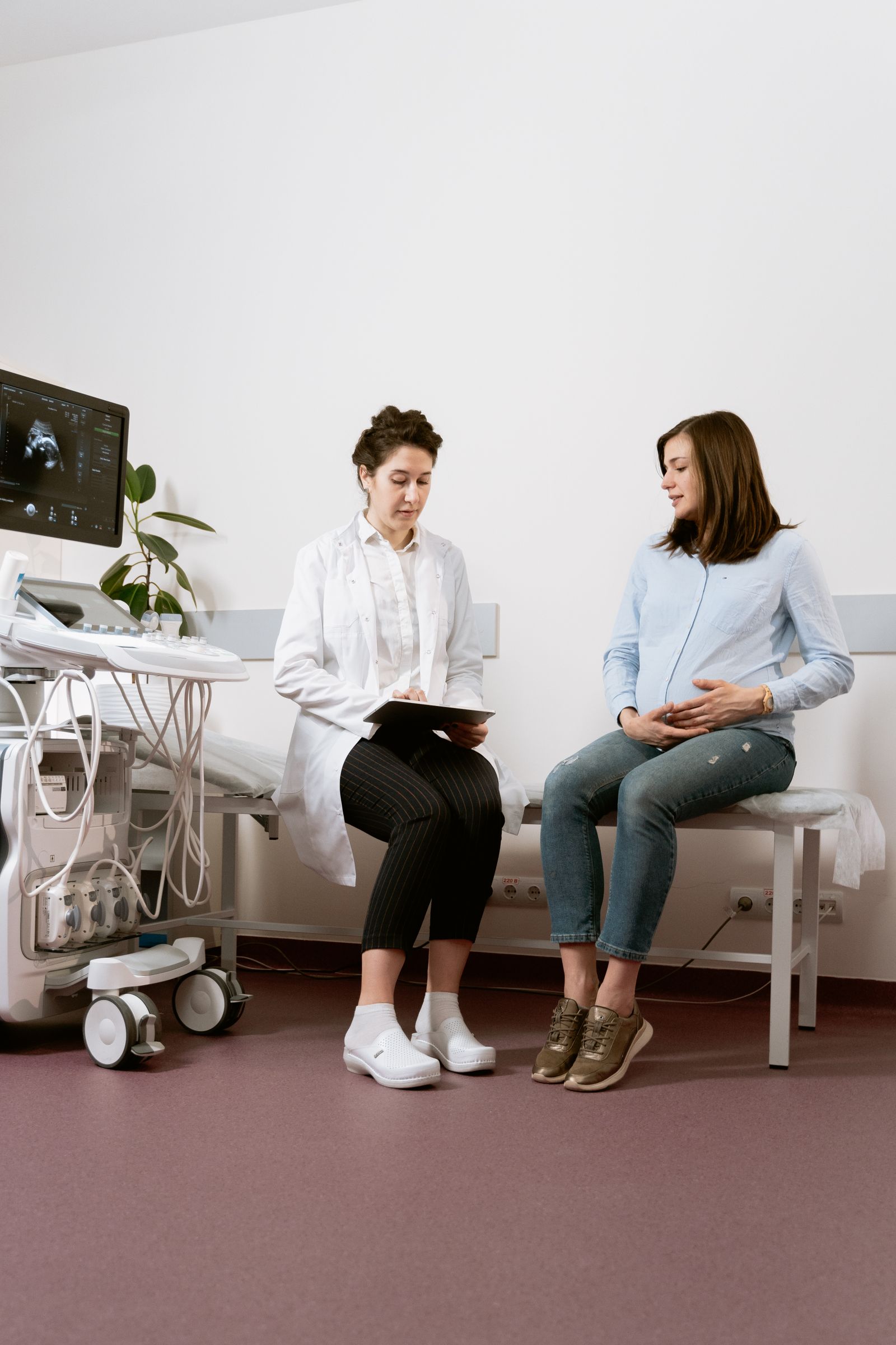 A pregnant woman at a consultation